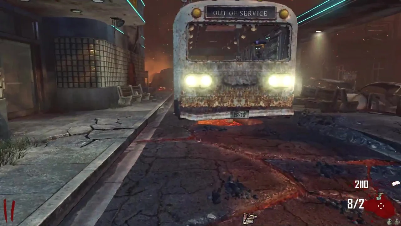The TranZit bus parked under the depot canopy, headlights on, at the Bus Depot in TranZit, Call of Duty Black Ops II Zombies