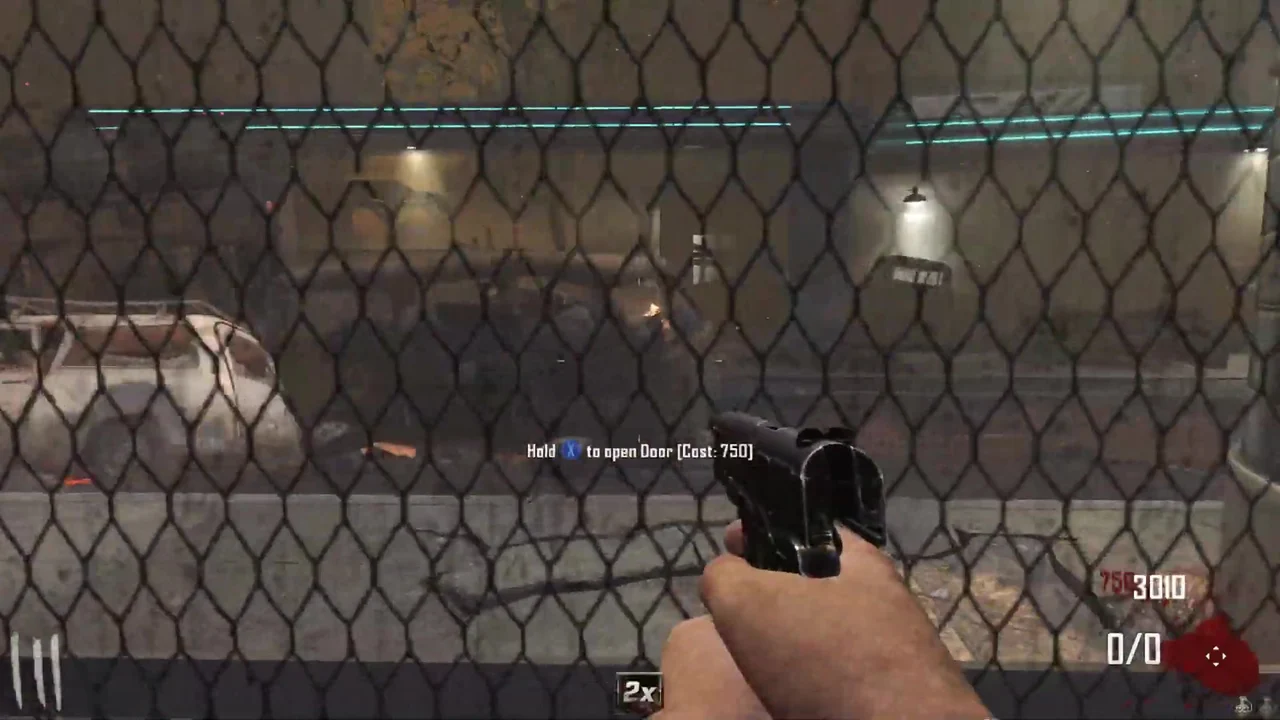 The chain-link door to the street with the prompt Hold to open Door, Cost 750, in Bus Depot, Call of Duty Black Ops II Zombies