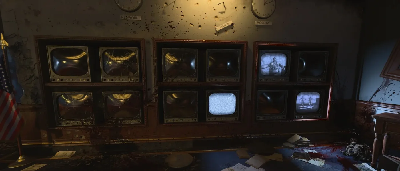 The bank of monitors on the left wall of the Panic Room, one of them showing static, Classified, Call of Duty Black Ops 4 Zombies