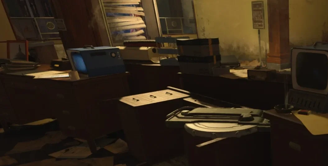 The teleporter pad part lying on an overturned table in the Main Offices, Classified, Call of Duty Black Ops 4 Zombies