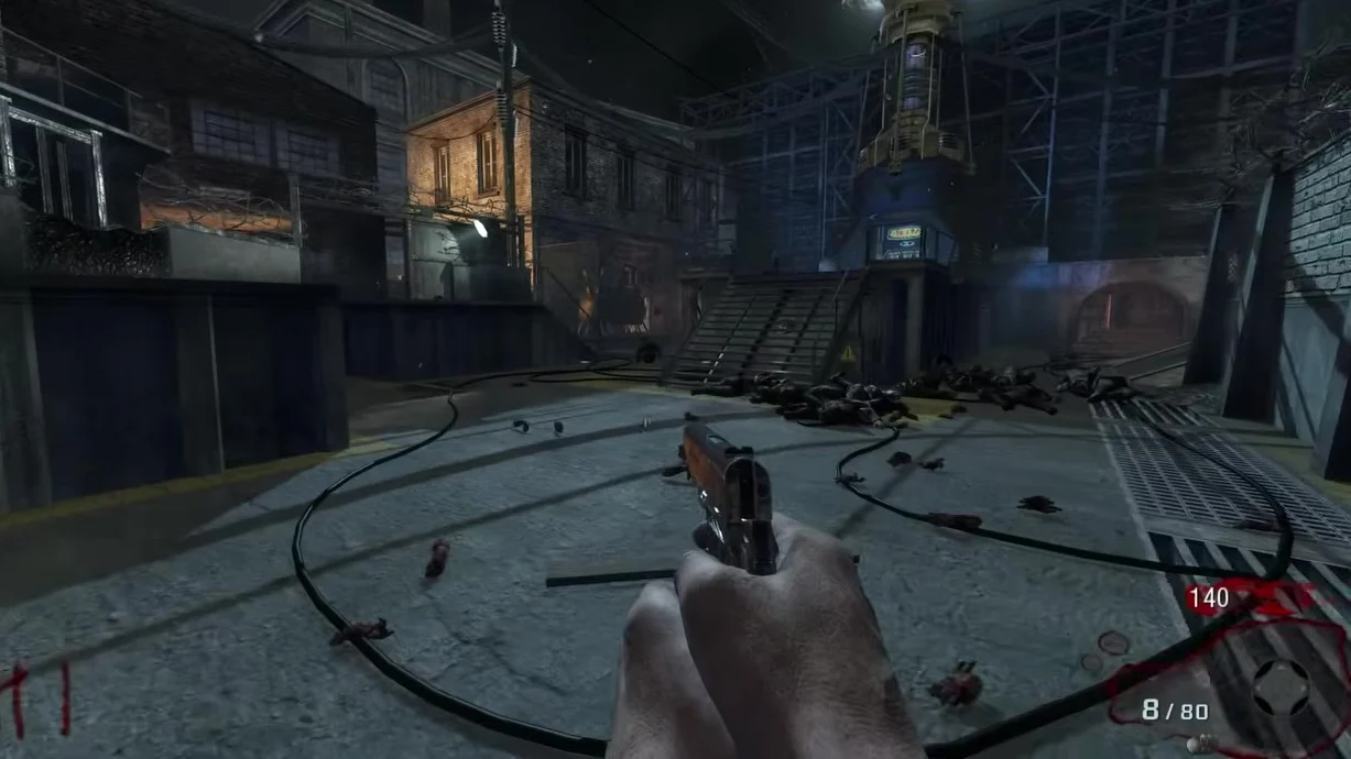 The starting courtyard of Der Riese, the round mainframe pad on the ground and the tower behind it, Call of Duty Black Ops Zombies