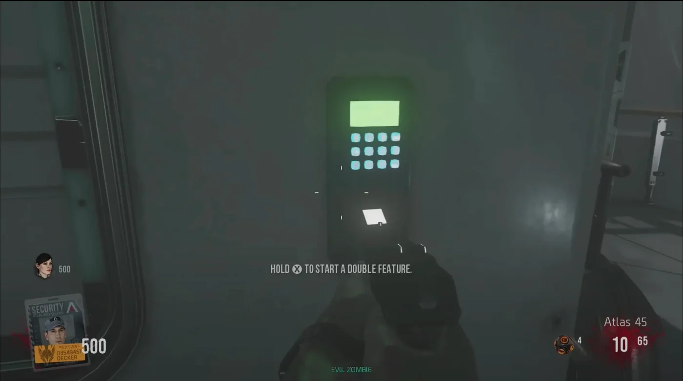 The keypad that starts Double Feature, on a wall of the Landing, with its prompt on screen, Descent, Call of Duty Advanced Warfare Zombies