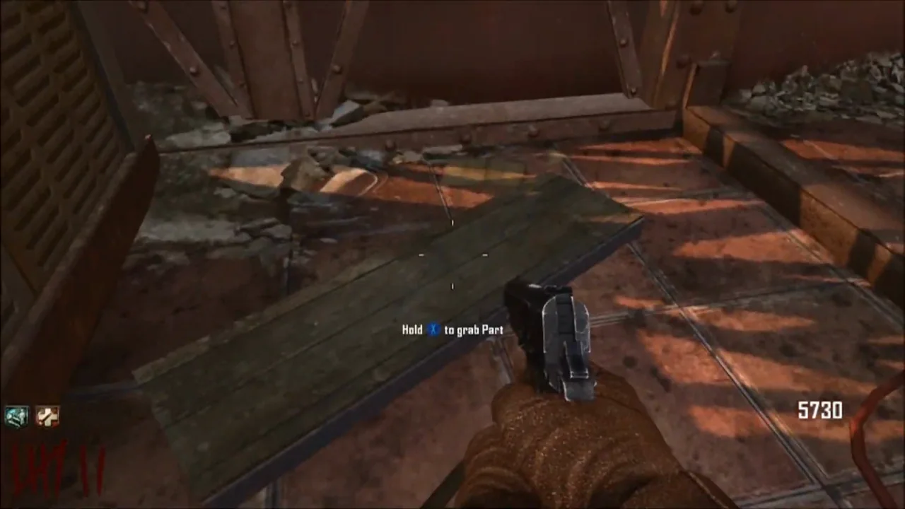 The table, a NAV Table part, on the floor next to an air vent, Hold to grab Part in Die Rise, Call of Duty Black Ops II Zombies