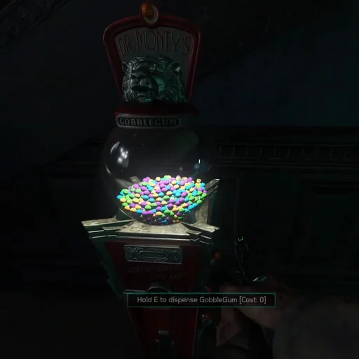 Dr. Monty's GobbleGum machine between the stairs of the Lobby, its prompt showing a cost of 0, Kino der Toten, Call of Duty Black Ops III Zombies