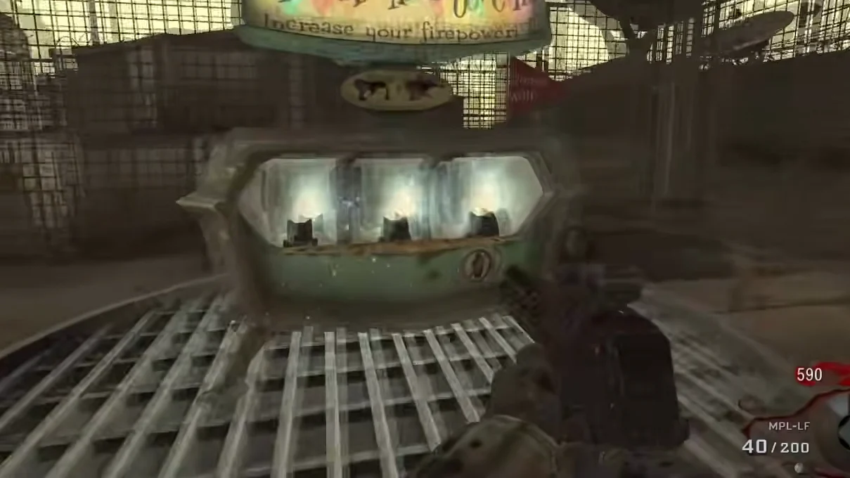The Pack-a-Punch machine under its sign inside its cage in Area 51 in Moon, Call of Duty Black Ops Zombies