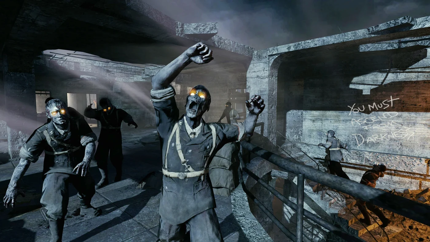 Black Ops zombies with glowing eyes climbing toward the players, "You must ascend from darkness" written on the wall behind them in Nacht der Untoten, Call of Duty Black Ops Zombies