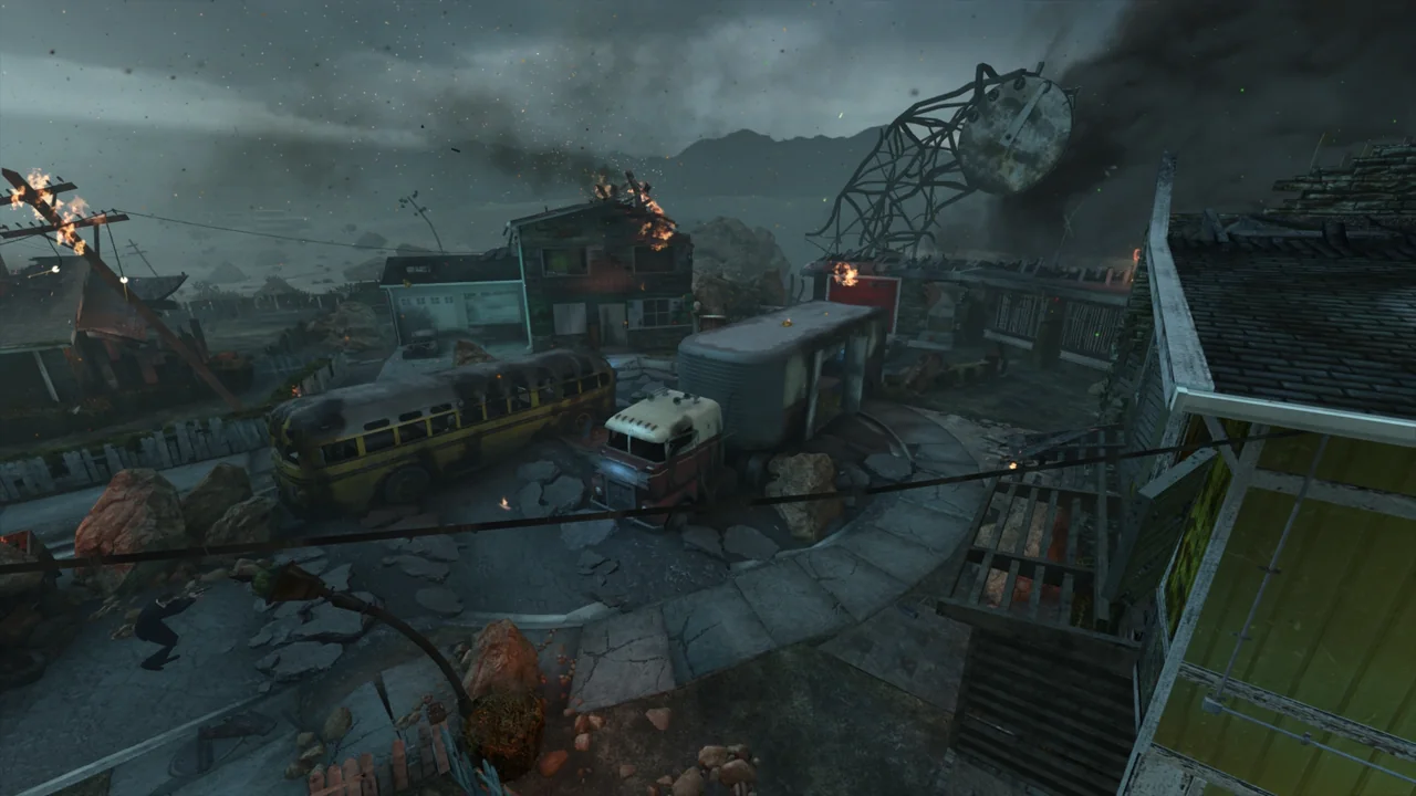 The street of Nuketown from above, the yellow bus and the red truck in the middle, the clock tower behind in Nuketown Zombies, Call of Duty Black Ops II Zombies
