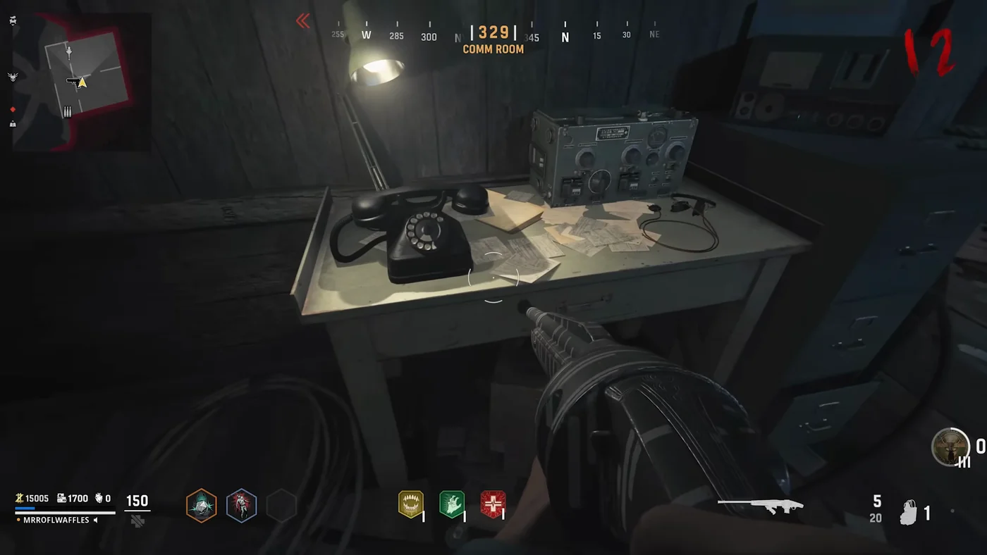 The black telephone on a desk of the Comm Room, next to a radio set, Shi No Numa, Call of Duty Vanguard Zombies