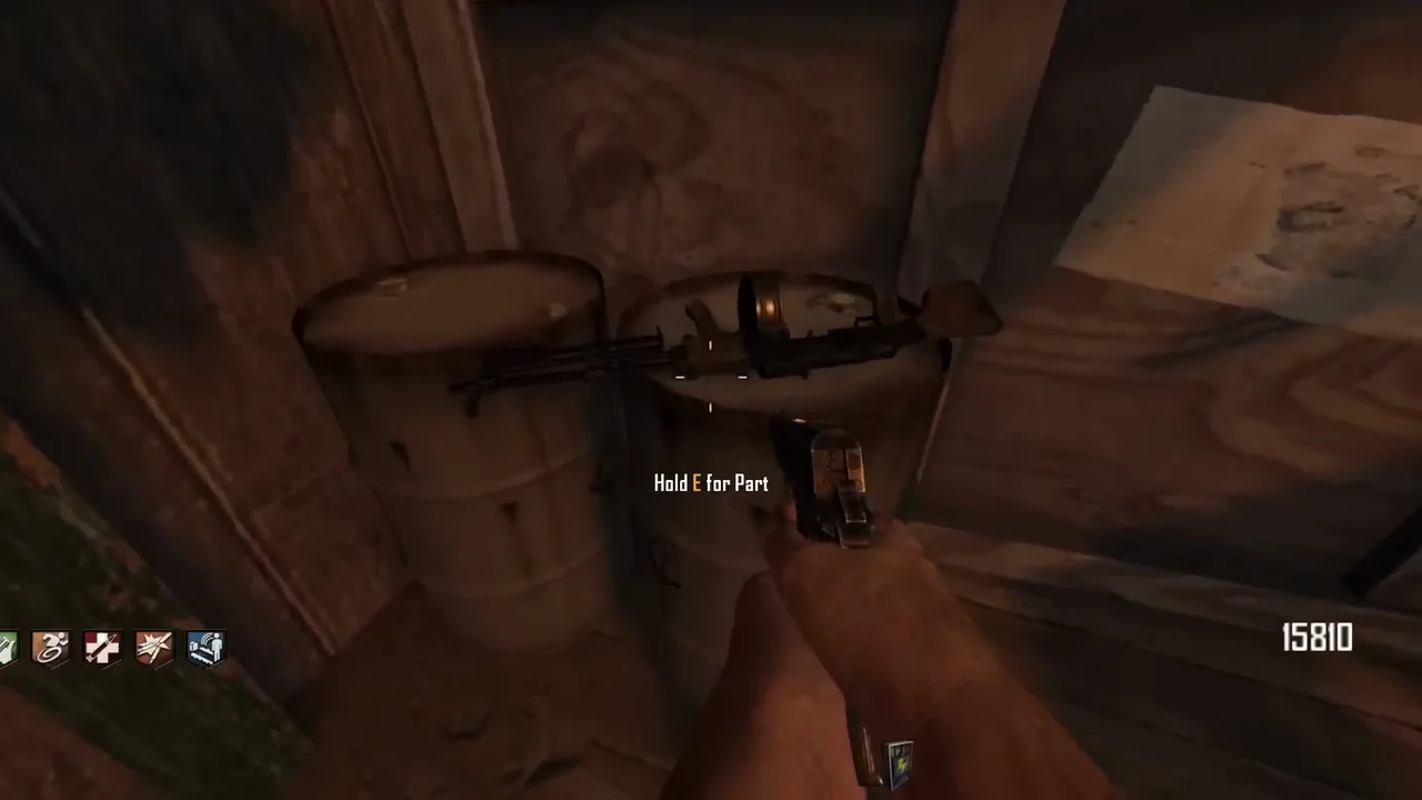 The unusable RPD of the Turret lying on barrels at the Farm, prompt Hold E for Part in TranZit, Call of Duty Black Ops II Zombies