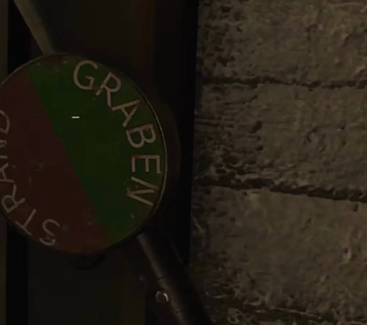 The destination lever of a minecart station, its disc marked Graben and Strand, The Darkest Shore, Call of Duty WWII Zombies