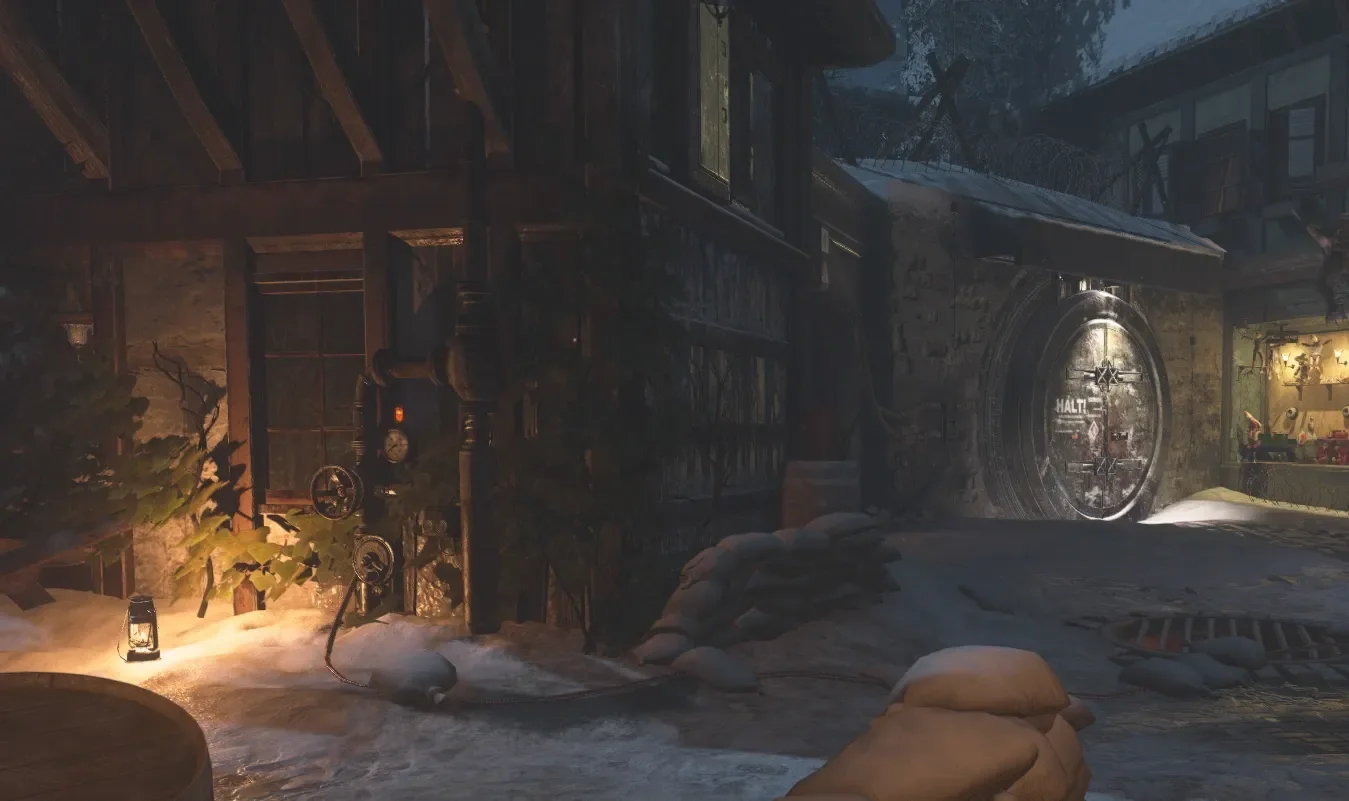 A gas valve in the snow next to the round bunker door of the Village Square, The Final Reich, Call of Duty WWII Zombies