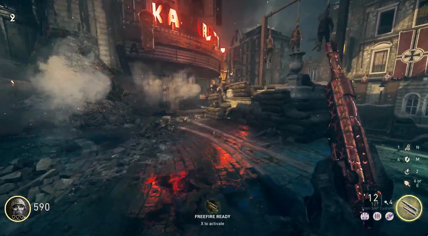 Main Street at night, with the burning Kabarett sign on the left, bodies hanging from a gallows and Iron Cross banners on the facades, The Shadowed Throne, Call of Duty WWII Zombies