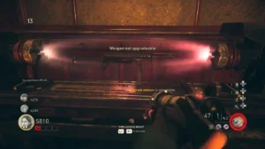 The Ubersprengen in its elevator, upgrading an MP-40 between two glowing coils, The Shadowed Throne, Call of Duty WWII Zombies