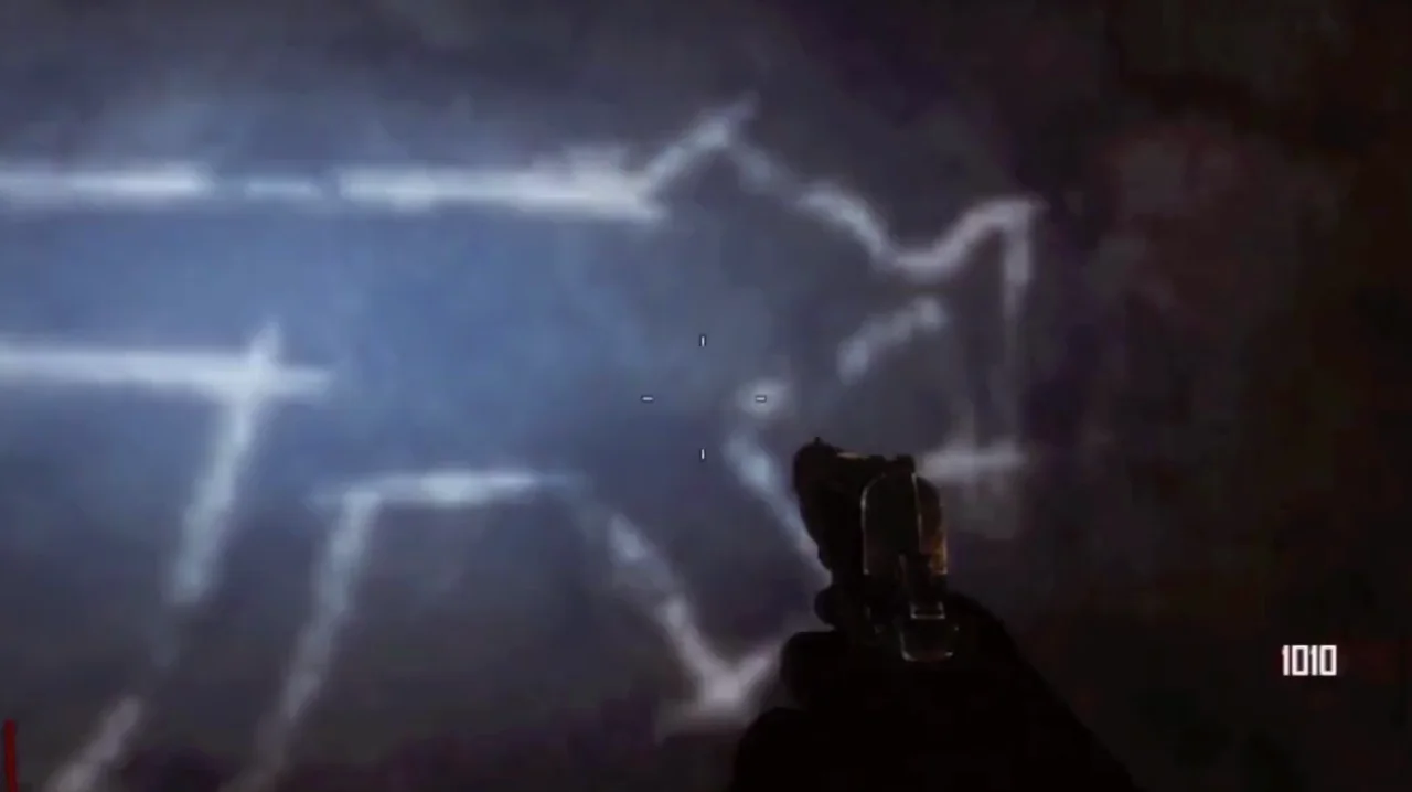 The MP5 chalk drawing lit up on the wall upstairs in the Juggernog house in Town, Call of Duty Black Ops II Zombies