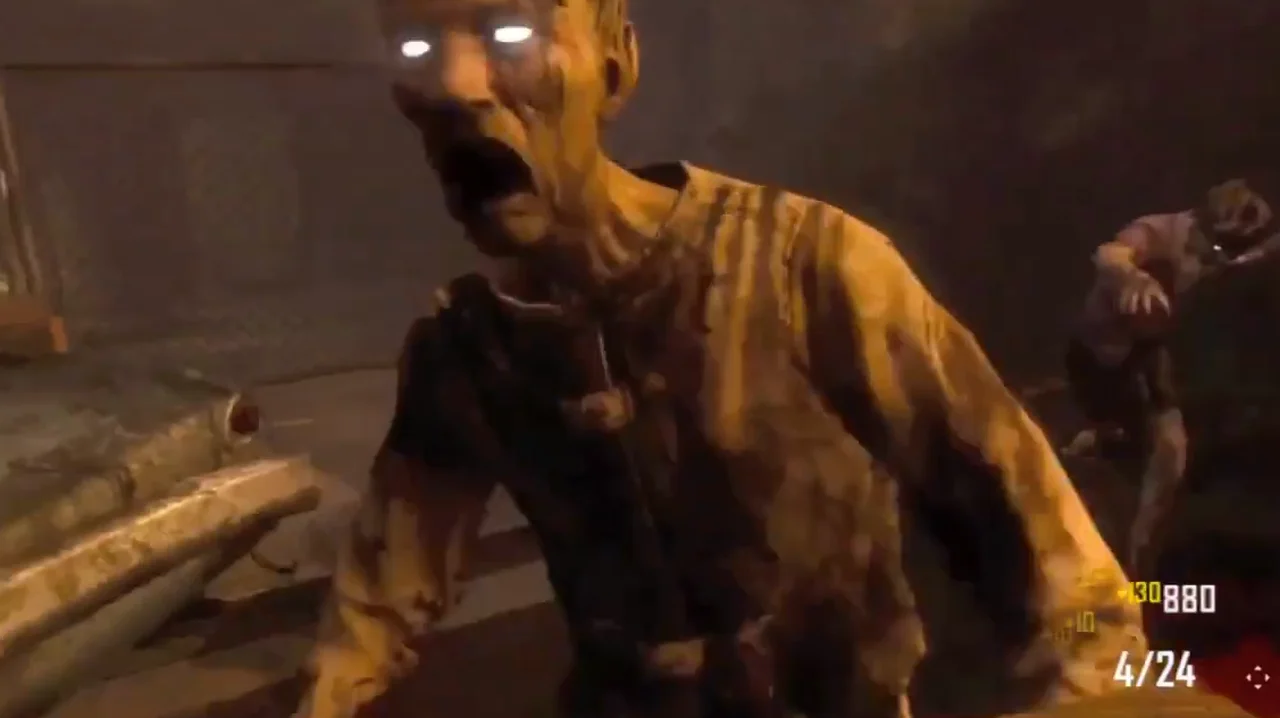 A zombie with glowing eyes lunging at the player in the street in Town, Call of Duty Black Ops II Zombies