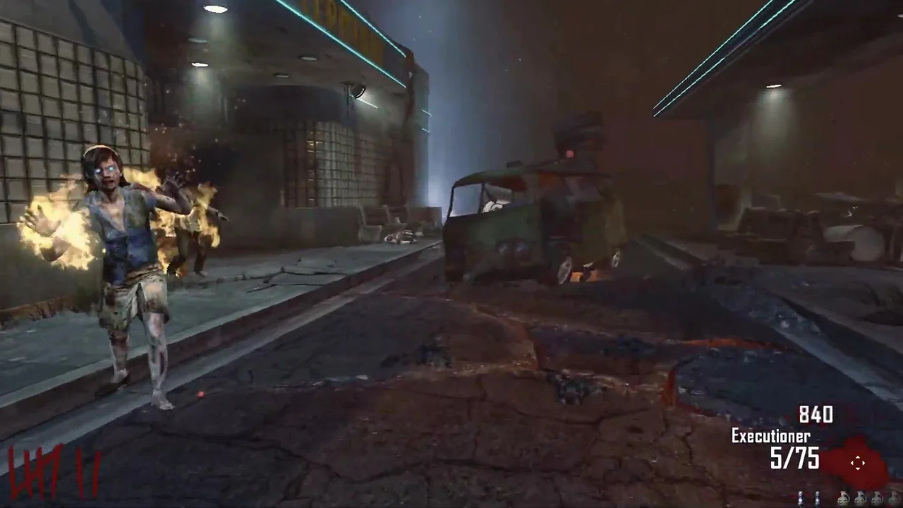 A zombie on fire walking along the depot after crossing lava at the Bus Depot in TranZit, Call of Duty Black Ops II Zombies