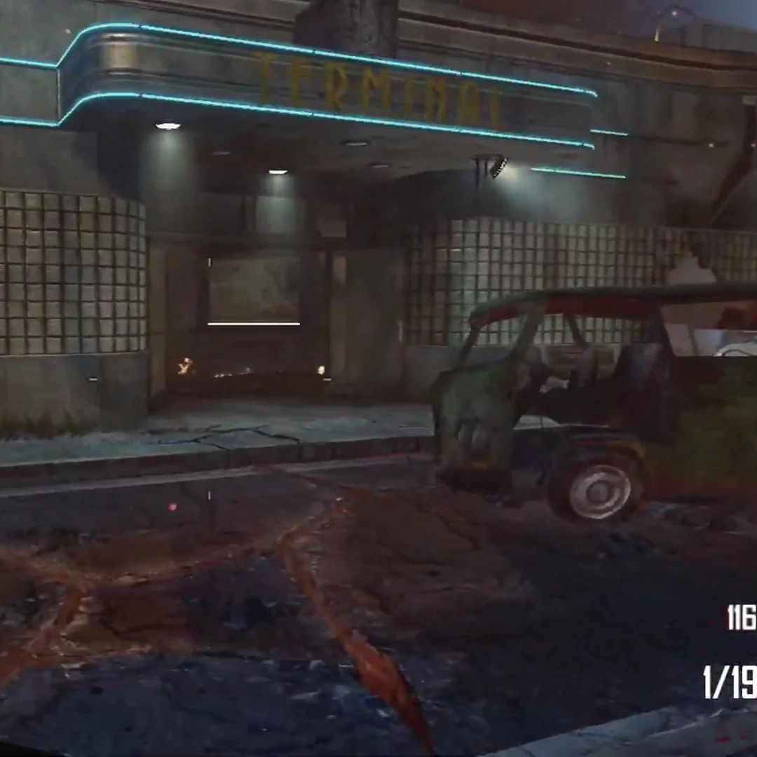 The front of the depot with its neon Terminal sign and lava cracks in the street at the Bus Depot in TranZit, Call of Duty Black Ops II Zombies