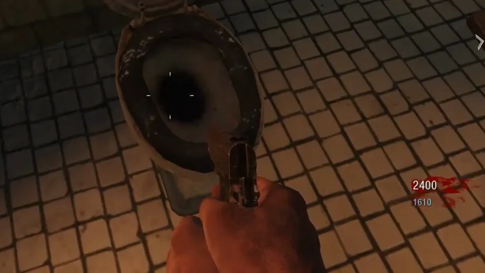The leftmost toilet of the bathroom upstairs on the German side, the Lullaby for a Dead Man Easter egg in Verrückt, Call of Duty Black Ops Zombies