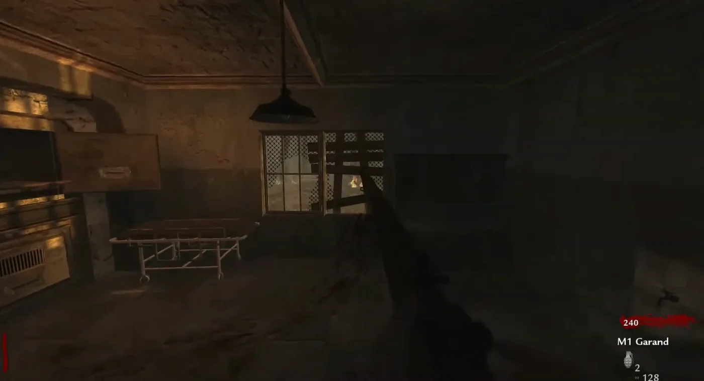 The morgue corner of the Quick Revive side starting room, with its cabinets, a gurney and a barricaded window, Verrückt, Call of Duty World at War Zombies